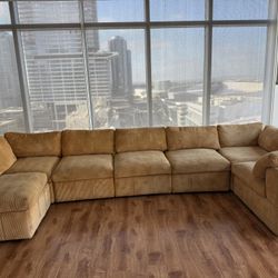 Modern Reversible Sectional + Ottoman 