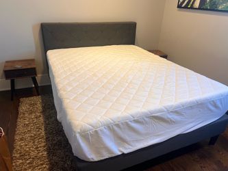 Bed frame with 2 night stands ( barely used)