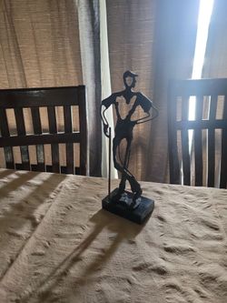Bronze golfer statue