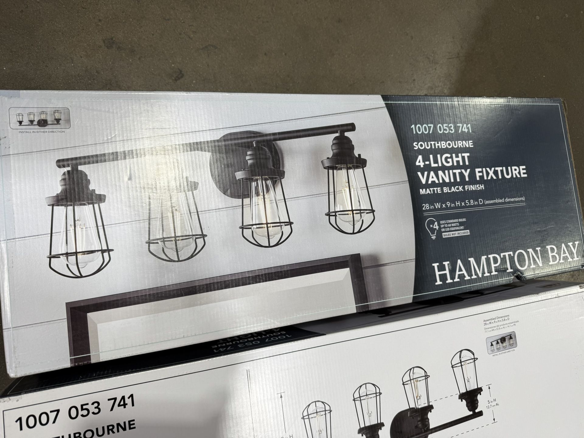 Hampton Bay Southbourne 28 in. 4-Light Matte Black Vanity Light with Open Steel Cage Frame
