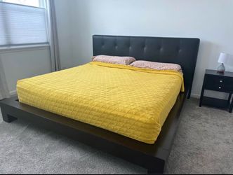 King size black leather bed