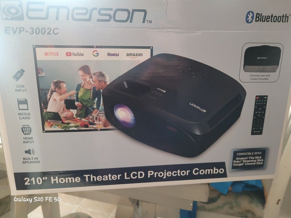 Projector With Screen Brand New In Box Includes Remote And Carrying Case.