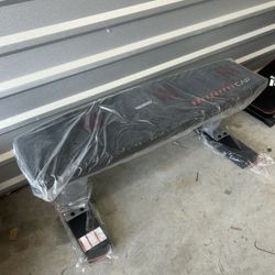 New cap barbell flat bench $45