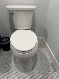 1 Almost New White Kohler Highline 19” Tall Elongated Toilets