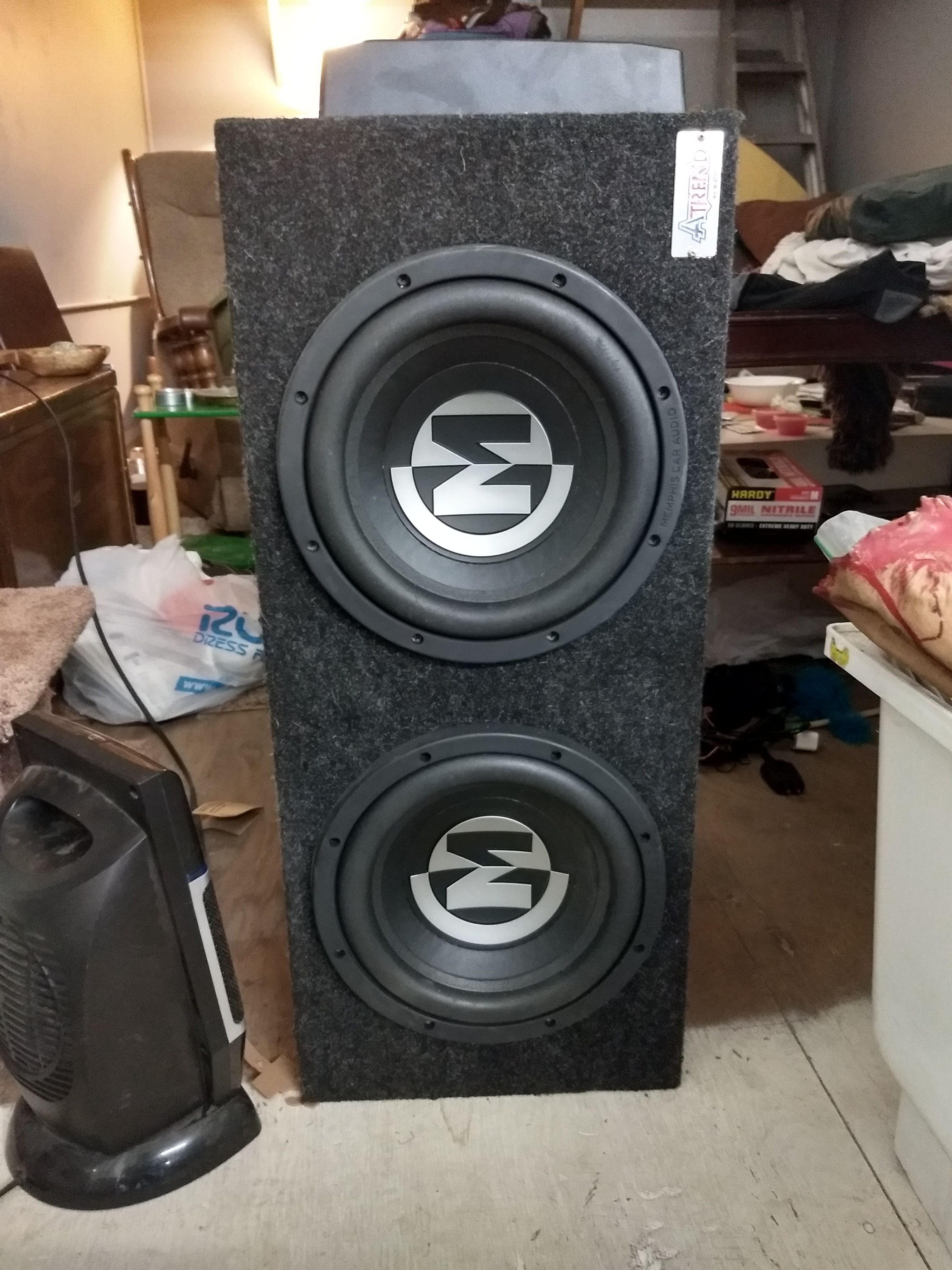 Two 15-PR10D4V2 - Memphis Power Reference 10" DVC 4 ohm Subwoofers in a sealed box with a Kenwood KAC-7025 500 RMS WATT amp.