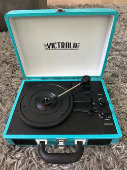 Victrola Journey - Bluetooth Suitcase Record Player - Turquoise Built-in stereo speakers, 3-speed turntable plays 7", 10" and 12" records, Bluetooth