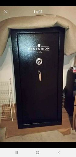 Liberty Gun safe. Holds 22 Rifles, Adjustable shelving, 28 wide x 20 deep x 59 height, combination Lock .  