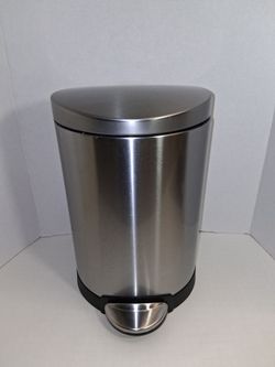 small stainless steel bathroom trashcan with step on to open lid $10 FIRM