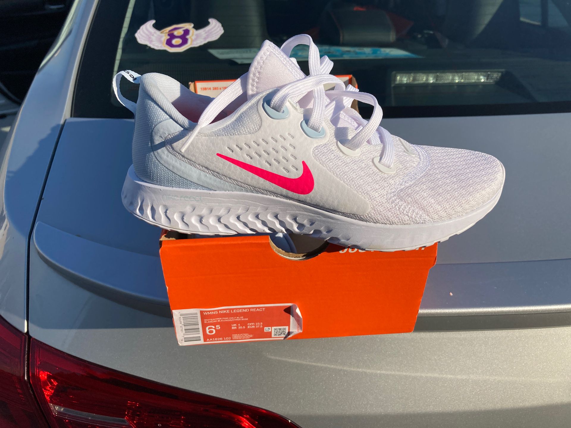 Nike women's legend react women running shoe white pink