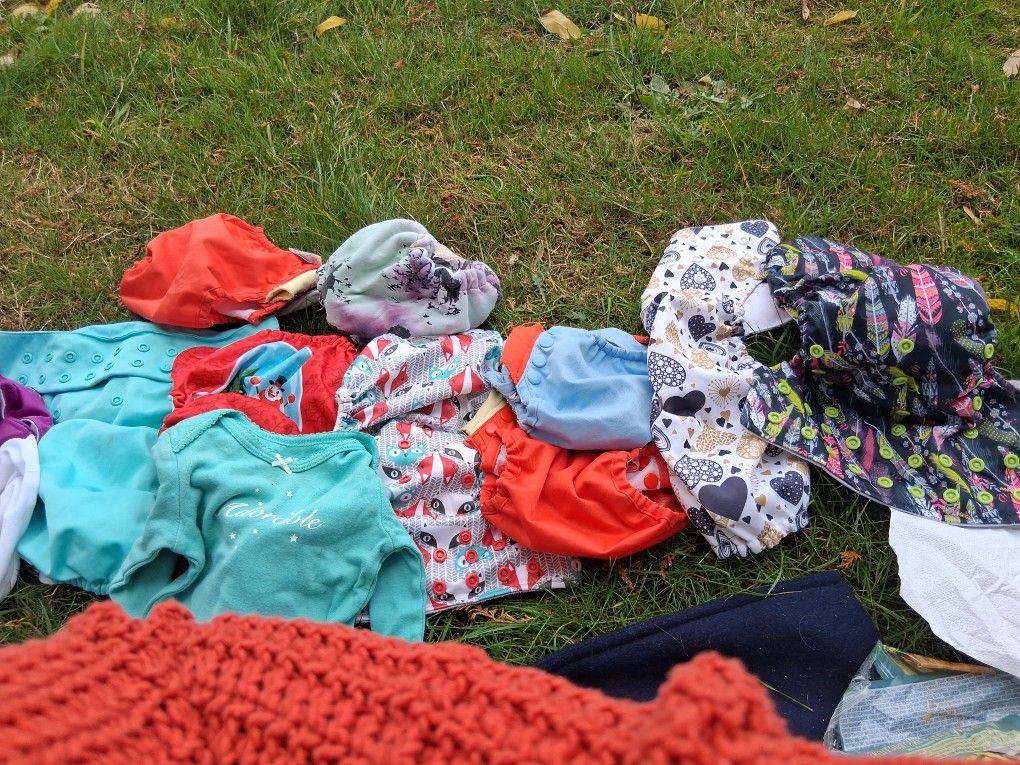 Ten Reusable Diapers For Girls Plus One Onsie