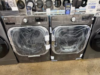 Brand new LG jumbo Stainless steel front load washer and gas dryer set