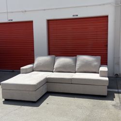 Reversible chaise beige sofa