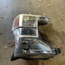 Ford F250 F(contact info removed) OEM Passenger Side Headlight (no Bulbs)