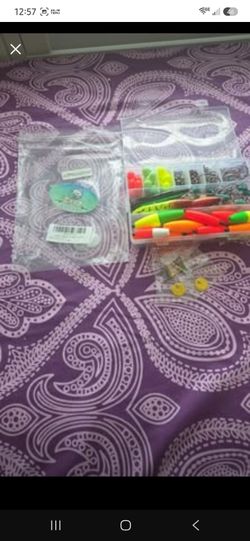 Orootl fishing tackle kit with floats , hooks and lures