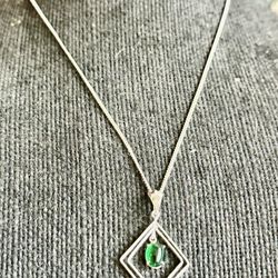 Very Beautiful pendant with Green Jade and Silver Charm