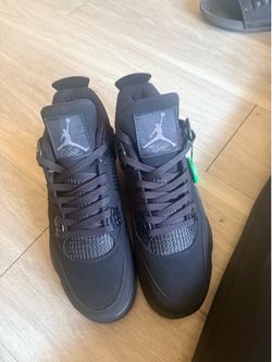 Black cat Jordan 4s