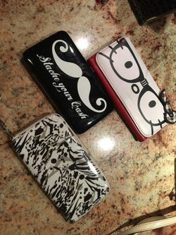 Super cute wallets with the 3 tier compartments