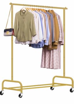 Gold rolling clothing rack store fixture