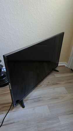 NEW FLAT-SCREEN SHARP TV