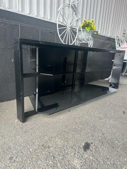 TV stand 55" long x 15" wide