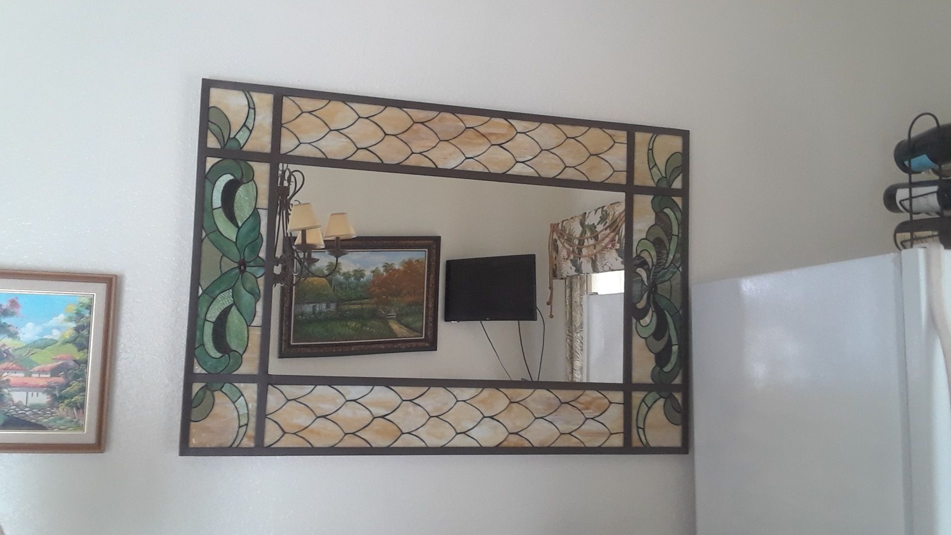 Large wall mirror with colorfull motif designs