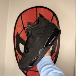 Black Cat Jordan 4s
