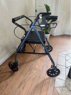 Large walker with seat