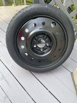 Kia 16 inch space saver spare tire. Never used.