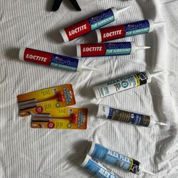 Caulking gun & Loctite, DAP sillicone And Trim Sealant 