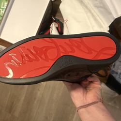 Christian Louboutin High-Top Sneakers (Size 39) is 7.5 