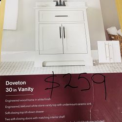 Home Decorators Collection Doveton 30 in. Single Sink Freestanding White Bath Vanity with White Engineered Marble Top (Assembled) Store SKU# 1008-022-