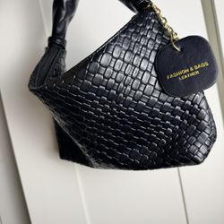 Black woven handbag