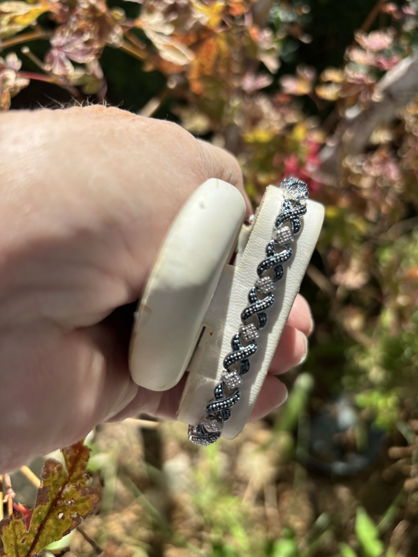 Blue Diamond X link bracelet in rhodium over silver