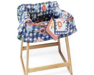 New in box Boppy Shopping Cart and Restaurant High Chair Cover - Navy & flowers . $16 located in menifee 