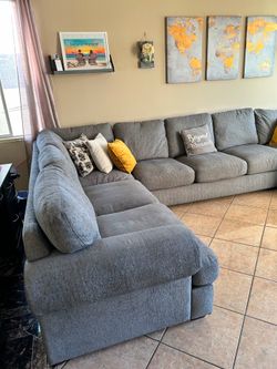 Large and super comfortable Grey Sectional Couch from Jerome’s