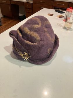 Handcrafted felt hat with pin