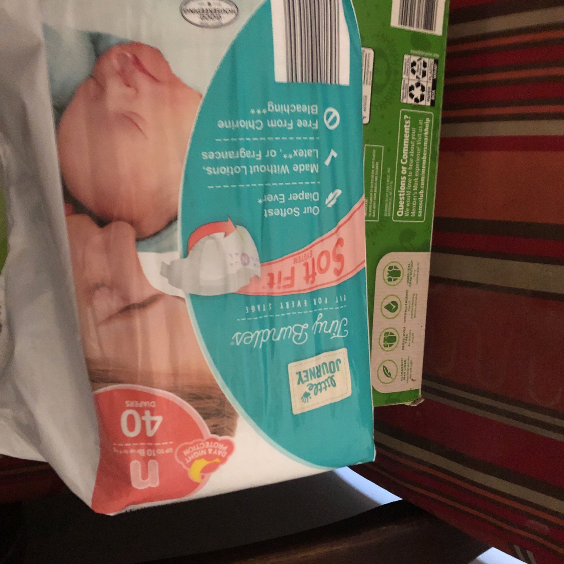 Box Of Newborn Diapers And A Pack Of Newborn Diapers 