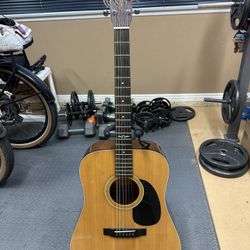 Used  Alvarez Acoustic Guitar w/ Bag, Beginner Music Book and 3+ sets of D'Addario strings. 