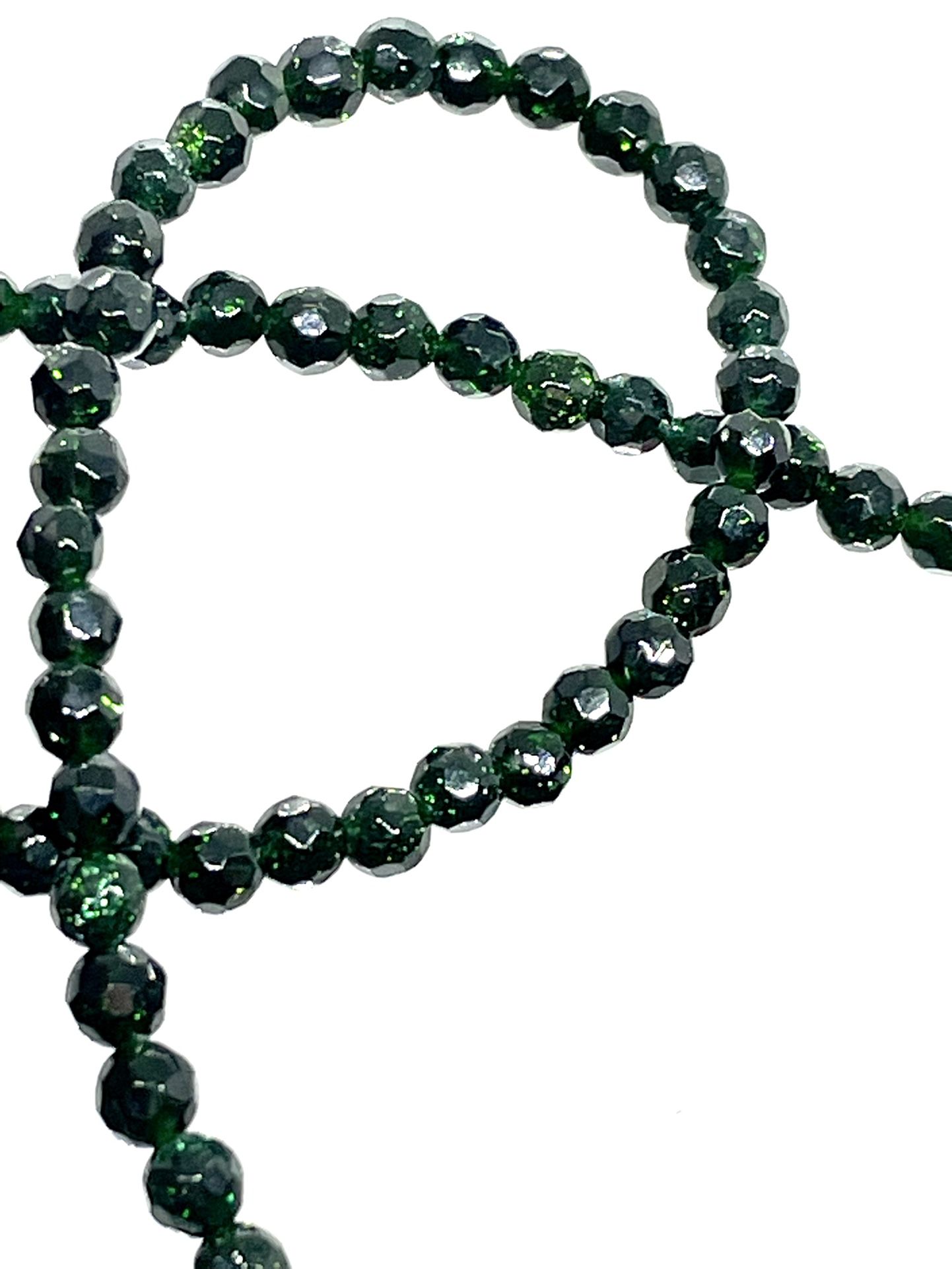 Faceted Green Goldstone