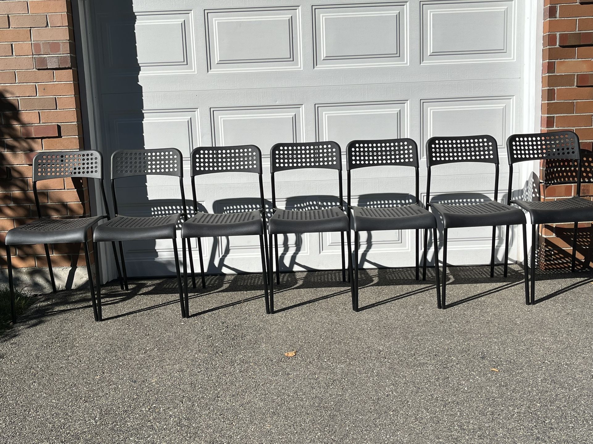Seven (7) Stackable Chairs
