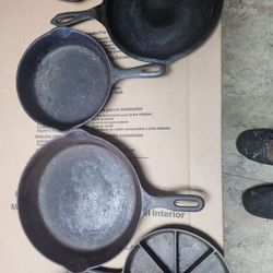 4 Cast Iron Skillets  1 Griddle 1 Corn Bread Pan