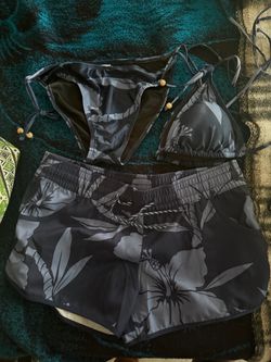 Woman’s bikini and board shorts set