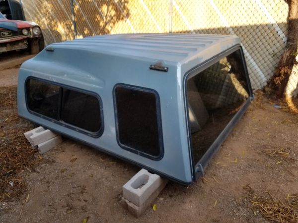 Truck camper shell bed size aproxament size 79L x 69 W with boat rack