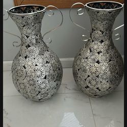 2 matching silver decor vases