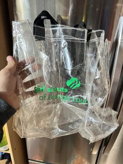 Girl Scouts rain poncho with clear bag