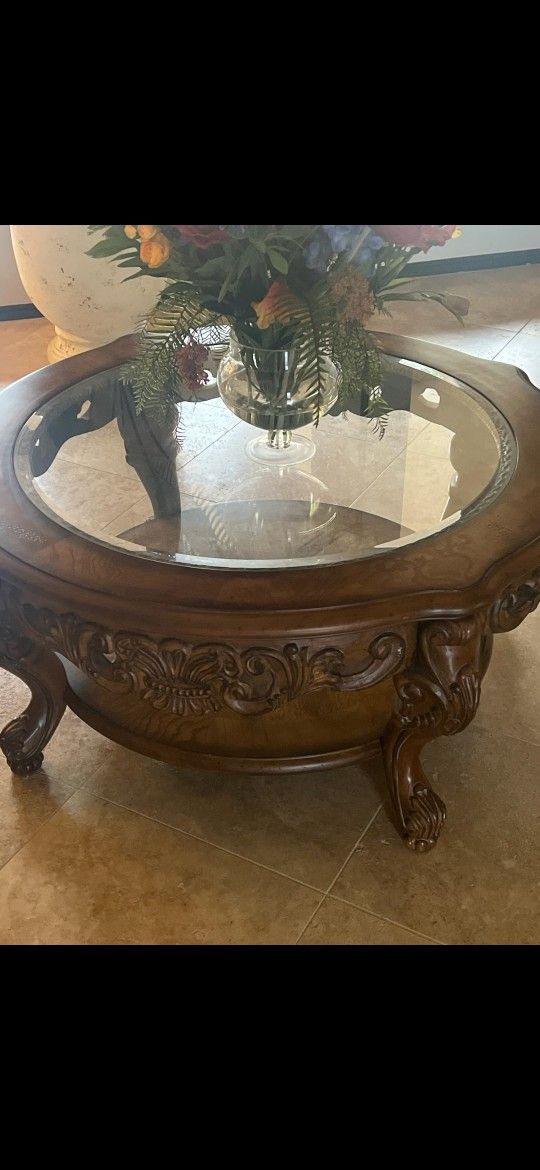 coffee table and brown chairs Furniture