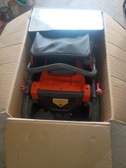 Orange Push Lawn Mower with Grass Bag
