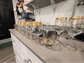 set of gold rimmed glasses