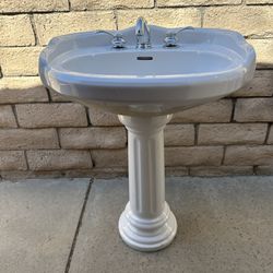 White Pedestal Sink With Faucet