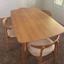 Modern table and 4 assorted chairs